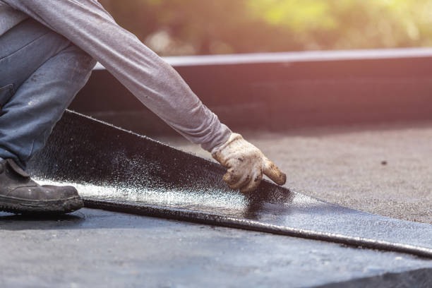 Professional Waterproofing technician working in Cambridge, WI